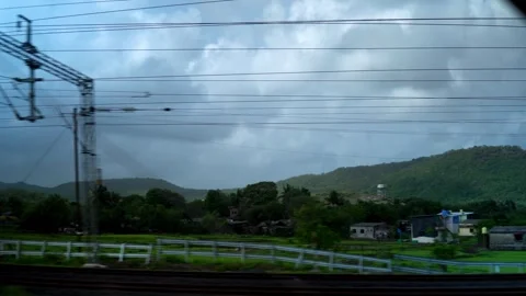 Monsoon Landscape Viewed From Moving Train in India Stock Footage 339929089