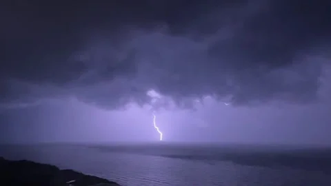 Monsoon Lightning Storm Bolts Over Ocean Reg Speed and Slowed for Full Effect Stock Footage 303118954