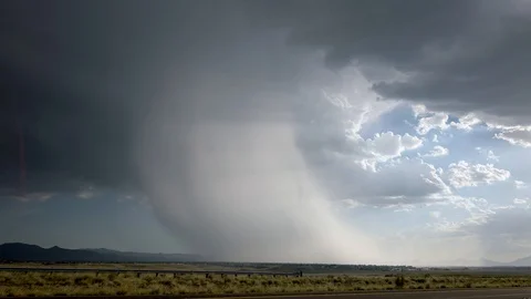 Monsoon Rain Microburst with Lightning Bolt Shafts of Light Stock Footage