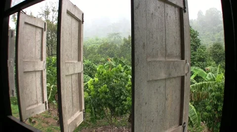 Monsoon Rains Through Open Barn Doors In Thailand 스톡 동영상 12429974