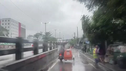 Monsoon rains trigger flooding, evacuations across Metro Manila, Luzon, METRO MA Video stock 341854081