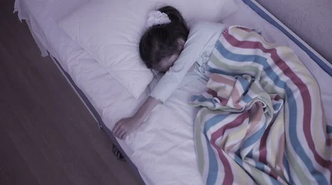 Monster coming out from under little girls bed. nightmare child. halloween Stock Footage