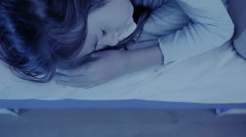 Monster coming out from under little girls bed. nightmare child. halloween Stock Footage