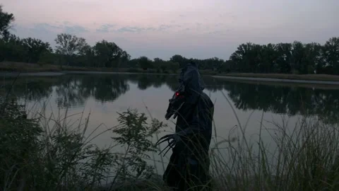 Monster roaming lagoon lakeside Stock Footage 209674981