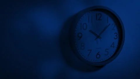 Monster Shadows Over Wall Clock At Night Stock Footage 303181971