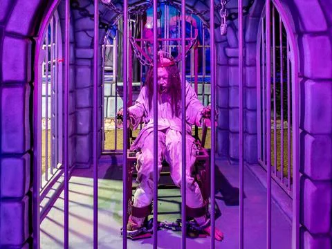 A monster trapped in a cage. Stock Photos