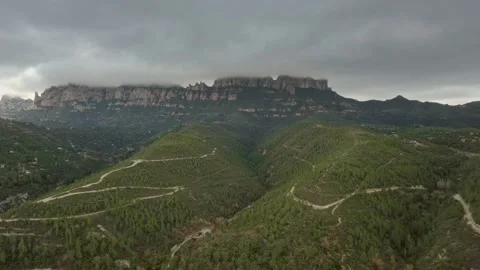 Monsterrat Mountains on Cloudy Foggy Day from Far Away Stock Footage