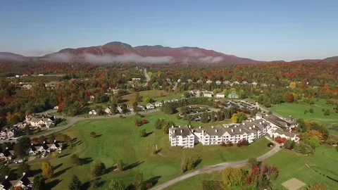 Mont Orford Mountain aerial autumn view with golf club Stock Footage