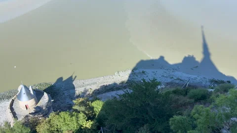 Mont Saint Michel Abbey Shadow Silhouette Over Tidal Bay, France Stock Footage 345295934