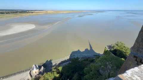 Mont Saint Michel Abbey Shadow Silhouette Over Tidal Bay, France Stock Footage 345296620