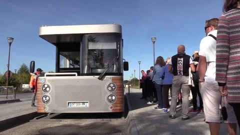 Mont St. Michel - Shuttle bus from island arrives at parking area Stock Footage 81102701