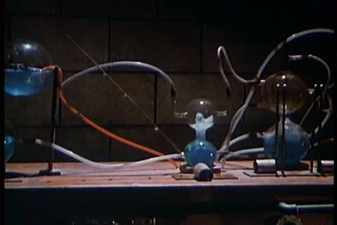 Montage of boiling flasks in science laboratory Stock Footage