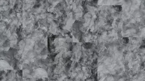 A montage of clouds of grey smoke on moving screens. Stock Footage 241085201