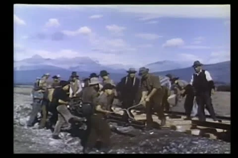 Montage - men building railroad Stock Footage 11350870