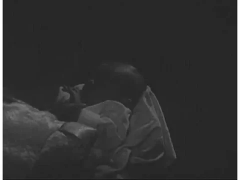 A montage shows a baby's basic needs, such as breast milk and being allowed to Stock Footage 74973120