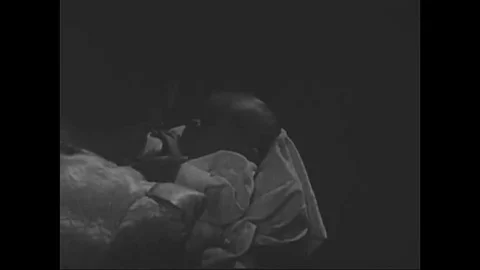 A montage shows a baby's basic needs, such as breast milk and being allowed to Stock Footage 147391480