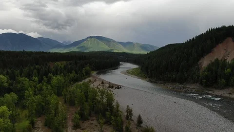 Montana colorful river valley and mountains low aerial push in 4K Mavic 2 Zoom Stock Footage