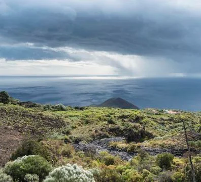 Montana del Azufre small volcano threatening clouds northeast of La Palma Stock Photos