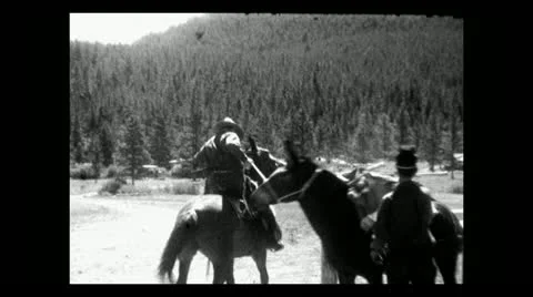 Montana getting ready to set out on the trail 1935 B-W 動画素材 12735858