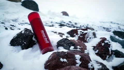 Montbell bottle in the mountains Stock Footage 160750998