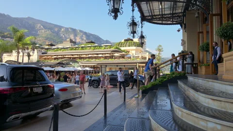 Monte Carlo, Monaco - August 21, 2024: People walking in front of the Monte Stock Footage 306352382