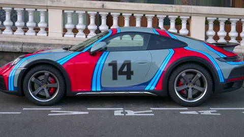 Monte Carlo, Monaco - August 25, 2024: A Porsche 911 Dakar with a mix of grey, Stock Footage 306379293