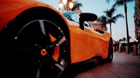 Monte Carlo, Monaco - October 4, 2024: Luxury cars moving through the courtyard Stock Footage 295597194