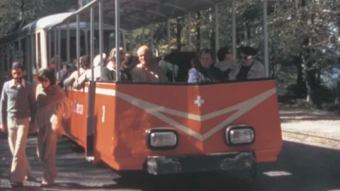 Monte Generoso - 1973: Tourists wait on board on touristic train in Switzerland Vidéo 295137697