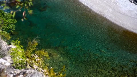 Montenegro, Crystal clear clean waters of moraca river flowing through green nat Stock Footage