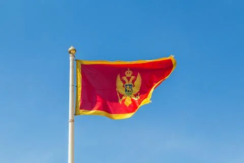 Montenegro flag flapping in the wind Stock Photos