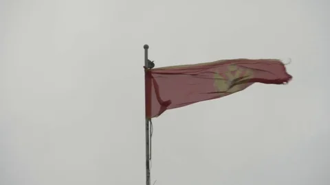 Montenegro Flag flutters in the wind Video stock 83701348