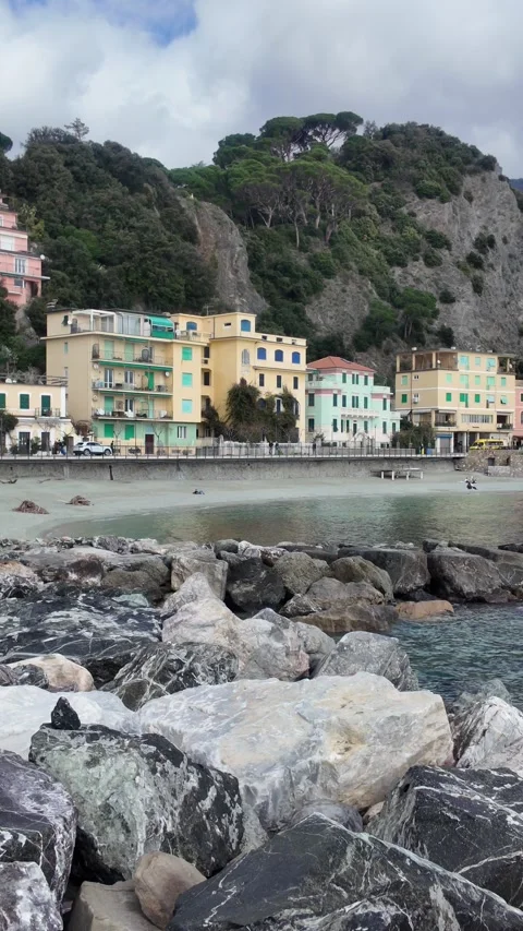 Monterosso Beach View - Seaside Buildings and Rocky Shore. Stock Footage 329848587