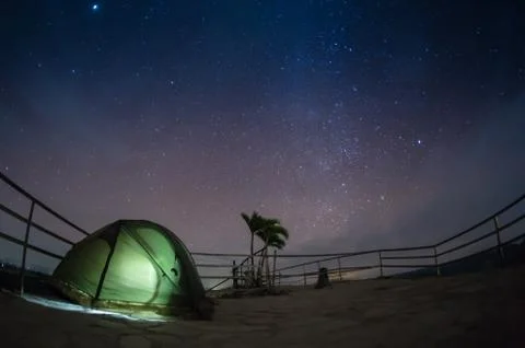 Month on a background star sky reflected in the sea Stock Photos