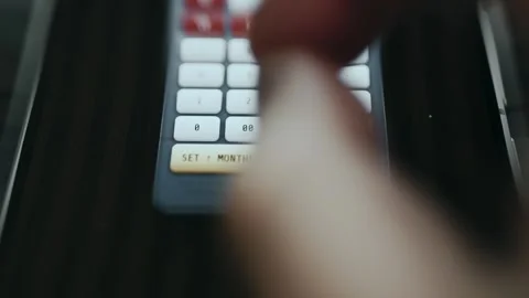 Monthly Contribution Calculator in Use Stock Footage 337044994