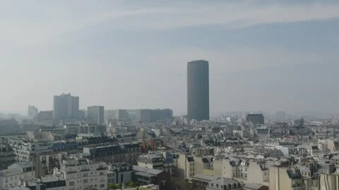 The Montparnasse Tower In Paris and the Eiffel Tower by drone Stock Footage 320103564