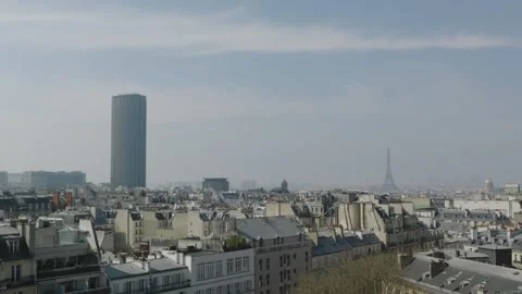 The Montparnasse Tower in Paris with the Eiffel tower in the background Stock Footage 320103553