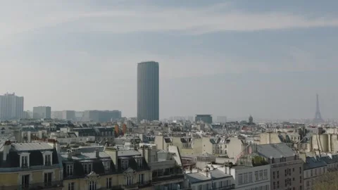The Montparnasse Tower In Paris With The Eiffel Tower In The Background Video Stock Footage 320103554