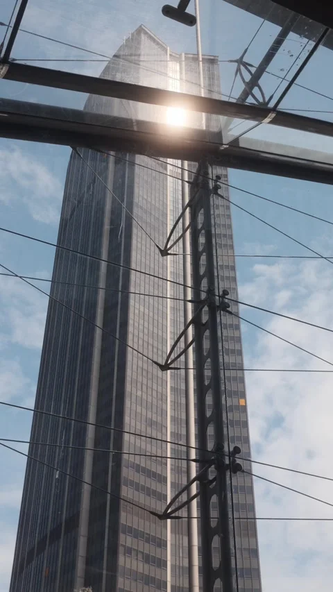 Montparnasse Tower with sunlight reflection Paris Stock Footage 334691187