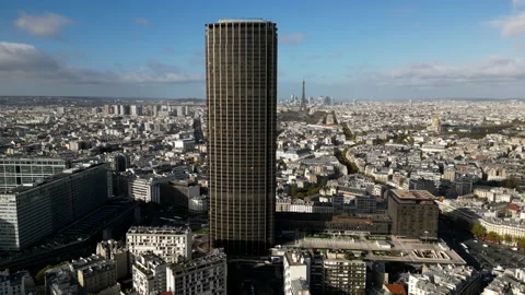 Montparnasse tower with Tour Eiffel in background, Paris in France. Aerial Stock Footage 225814552