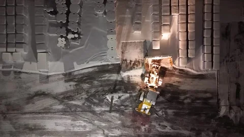 Montréal, Canada Dec '25 - Box plow pushing consolidated snow in staging yard Stock Footage 324869771