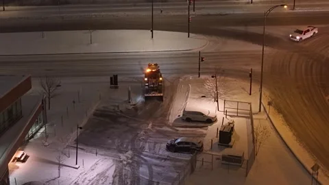 Montréal, Canada Dec '25 - grader plow evening small lot private driveway Stock Footage 324865217