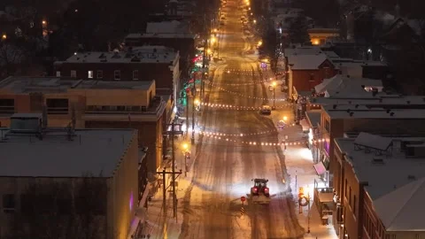 Montréal, Canada Dec '25 - A modest plow bringing character to the frozen city Stock Footage 324869288