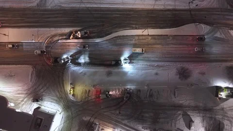 Montréal, Canada Dec '25 - A quiet ballet of steel carving paths in darkness Stock Footage 324868116