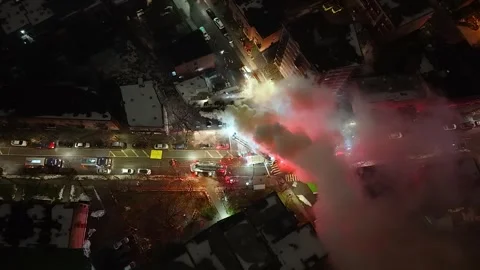 Montréal, Canada Dec 3 '25 - Overhead Night Choked Smoke And Blinding Lights Stock Footage 325538245