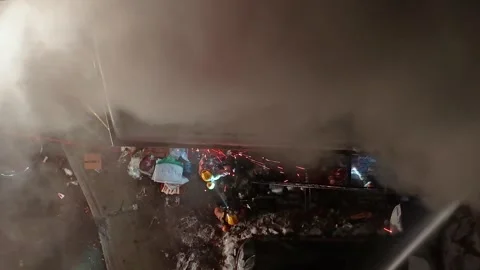 Montréal, Canada Dec 3 '25 - Chainsaw Sparks Carving Midnight Air Stock Footage 325538606