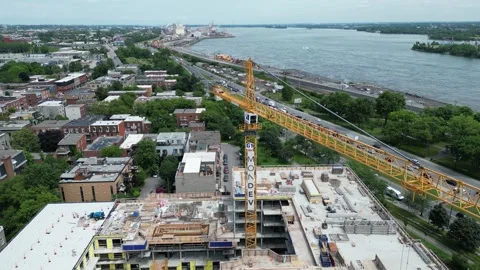 Montreal Construction Crane and Riverside Highway Aerial – Editorial 4K Stock Footage 332626370