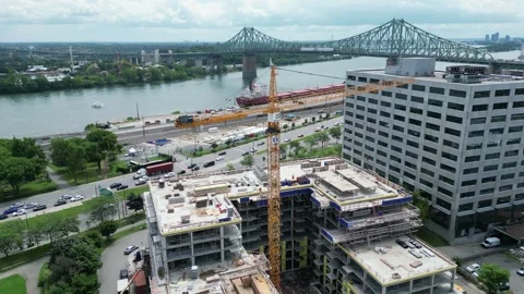 Montreal Construction Site and Jacques Cartier Bridge Aerial – Editorial 4K Stock Footage 332626330