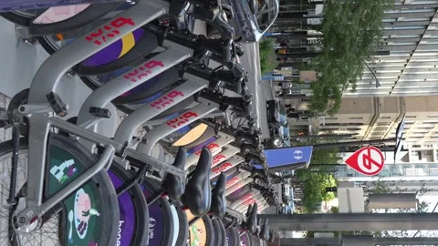 Montreal QC Canada - Oct 28, 2024: Bixi city bicycles for rent in downtown of Stock Footage 291597807