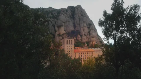 Montserrat monastery behind trees Video stock 32182252