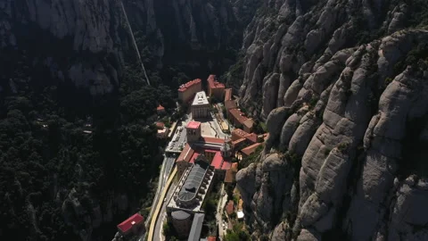 Montserrat monastery, Spain. Jun 2020. Aerial view of the abbey in gorge Stock Footage 146976690